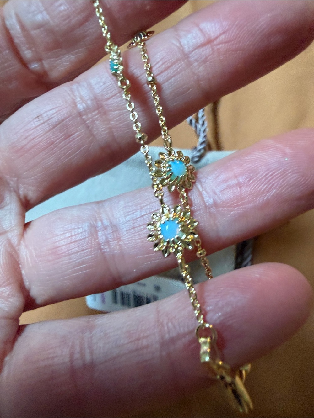 Kendra Scott NWT $44 Gold Bracelet with Turquoise Blue Flower Charms - Picture 5 of 5